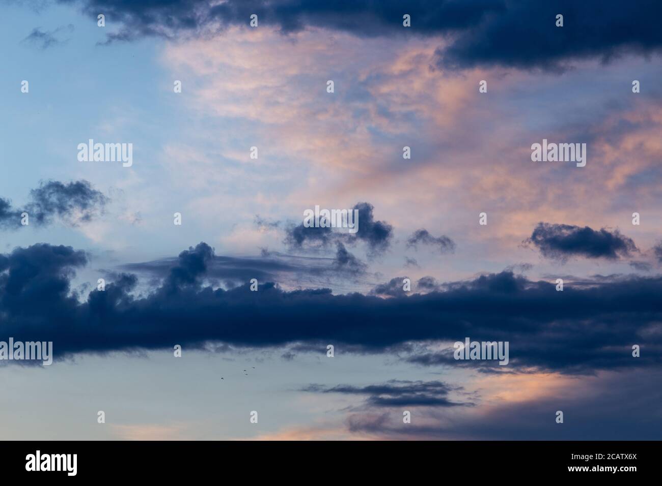 Low angle shot of the breathtaking clouds captured in the colorful sky ...