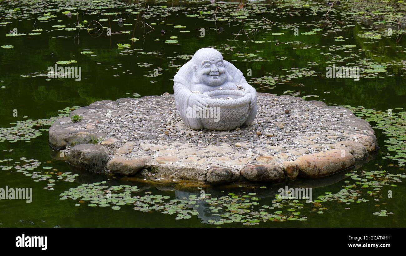 The statue of fat buddha Stock Photo Alamy