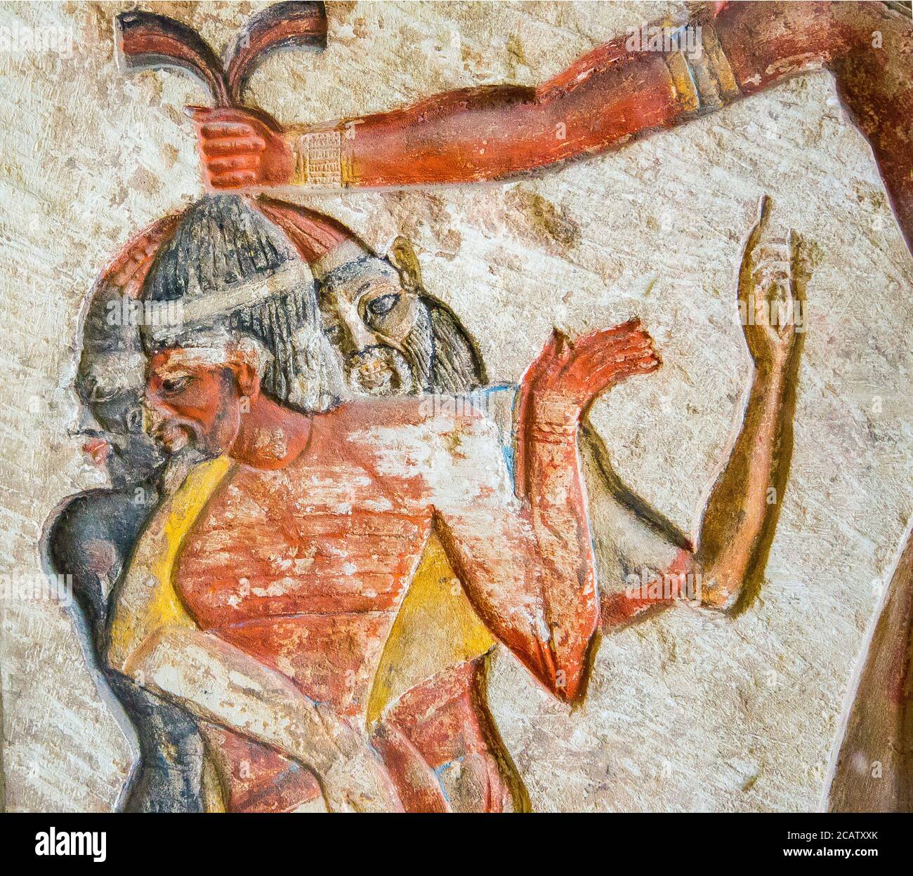 Egypt, Cairo, Egyptian Museum, relief of the king Ramses II killing foreign enemies : He holds a Nubian, a Libyan and a Syrian by the hair. Stock Photo