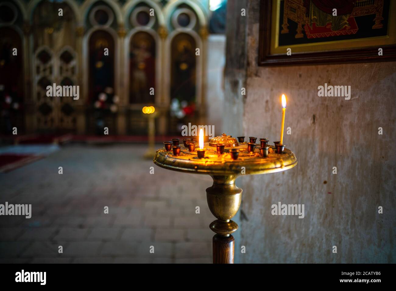 The candles in Holy Trinity Cathedral in Tbilisi, Georgia. Stock Photo