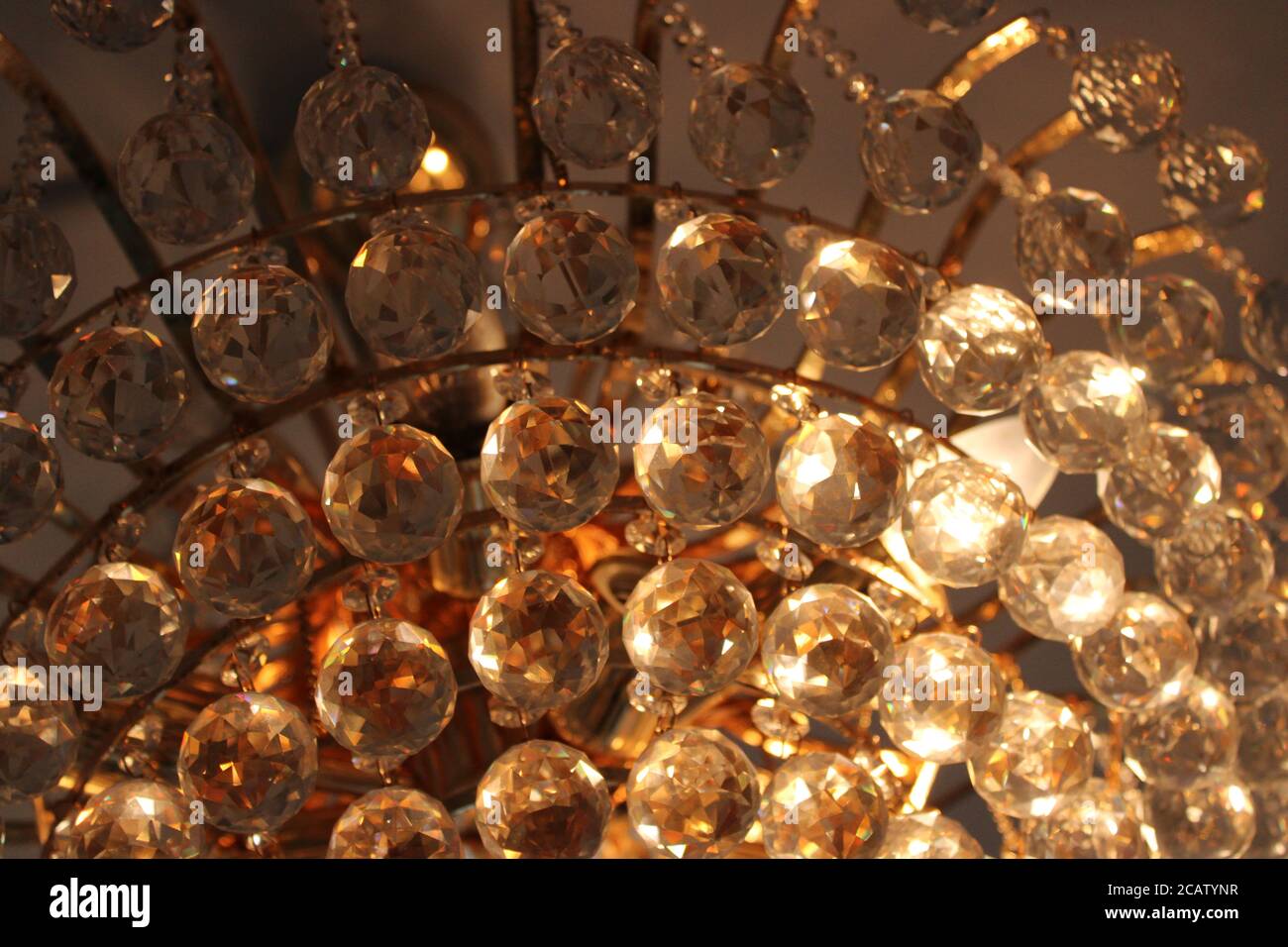 Closeup of enchanting  faceted crystal ball chandelier Stock Photo