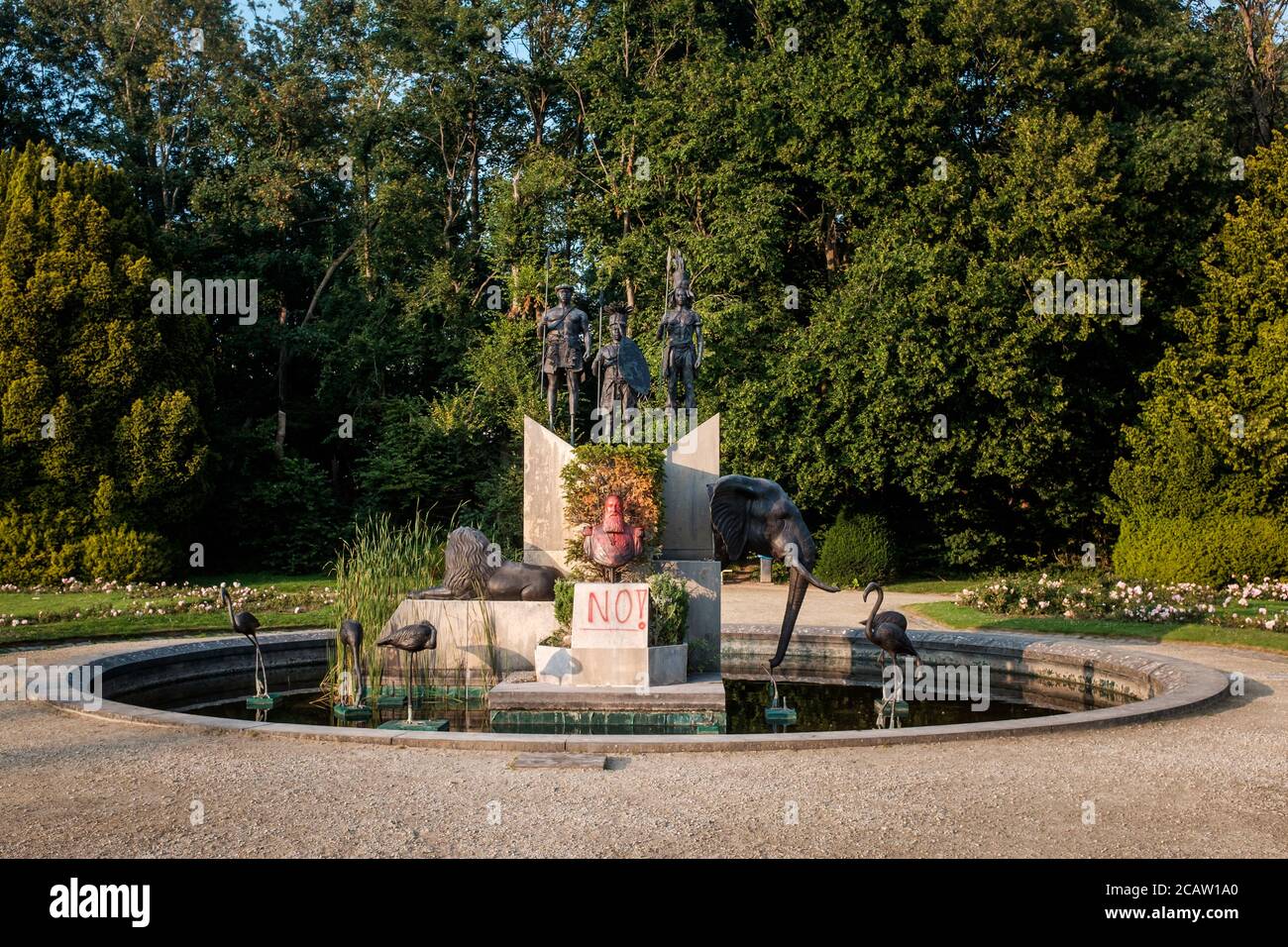 Statue of King Leopold II vandalized with red paint. Stock Photo