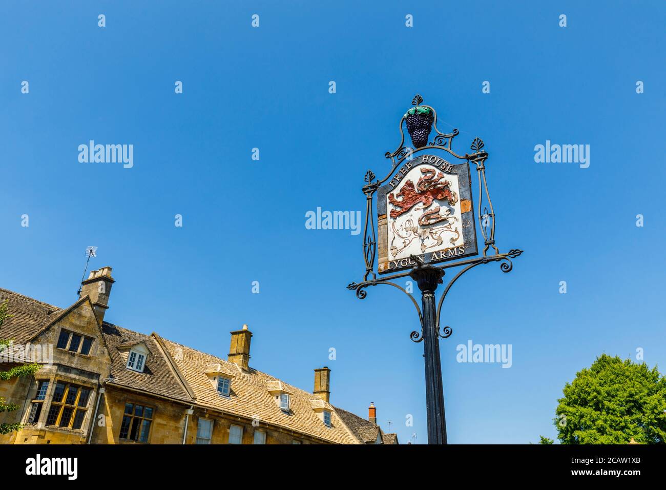 Dilapidated roadside name sign of the Lygon Arms in High Street, Chipping Campden, a small market town in the Cotswolds in Gloucestershire Stock Photo