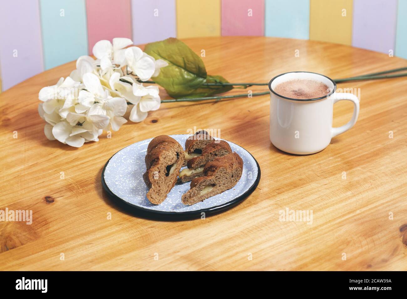 Download A High Angle Shot Of A Coffee Cup Near A Tasty Looking Dessert Stock Photo Alamy Yellowimages Mockups