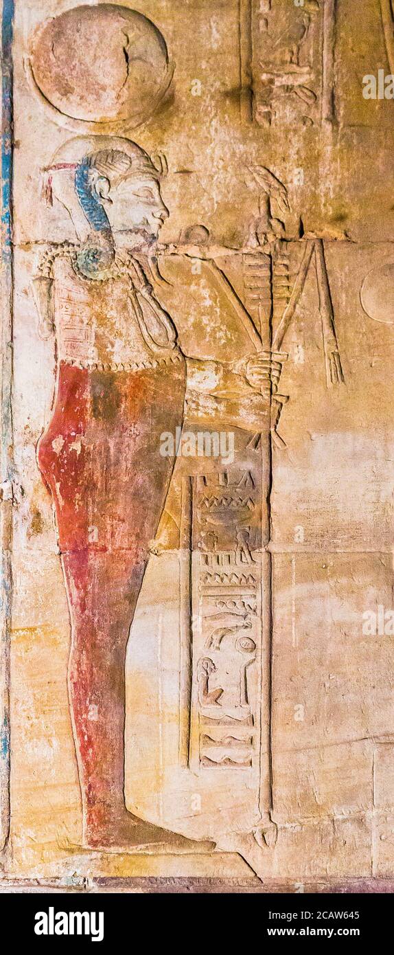 UNESCO World Heritage, Thebes in Egypt, Karnak site, ptolemaic temple of Opet. The god Khonsu has the sidelock of youth, a lunar disk, a Menat collar. Stock Photo