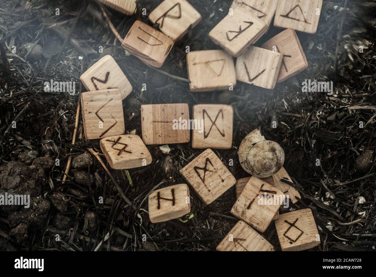wooden runes on the ground Stock Photo Alamy