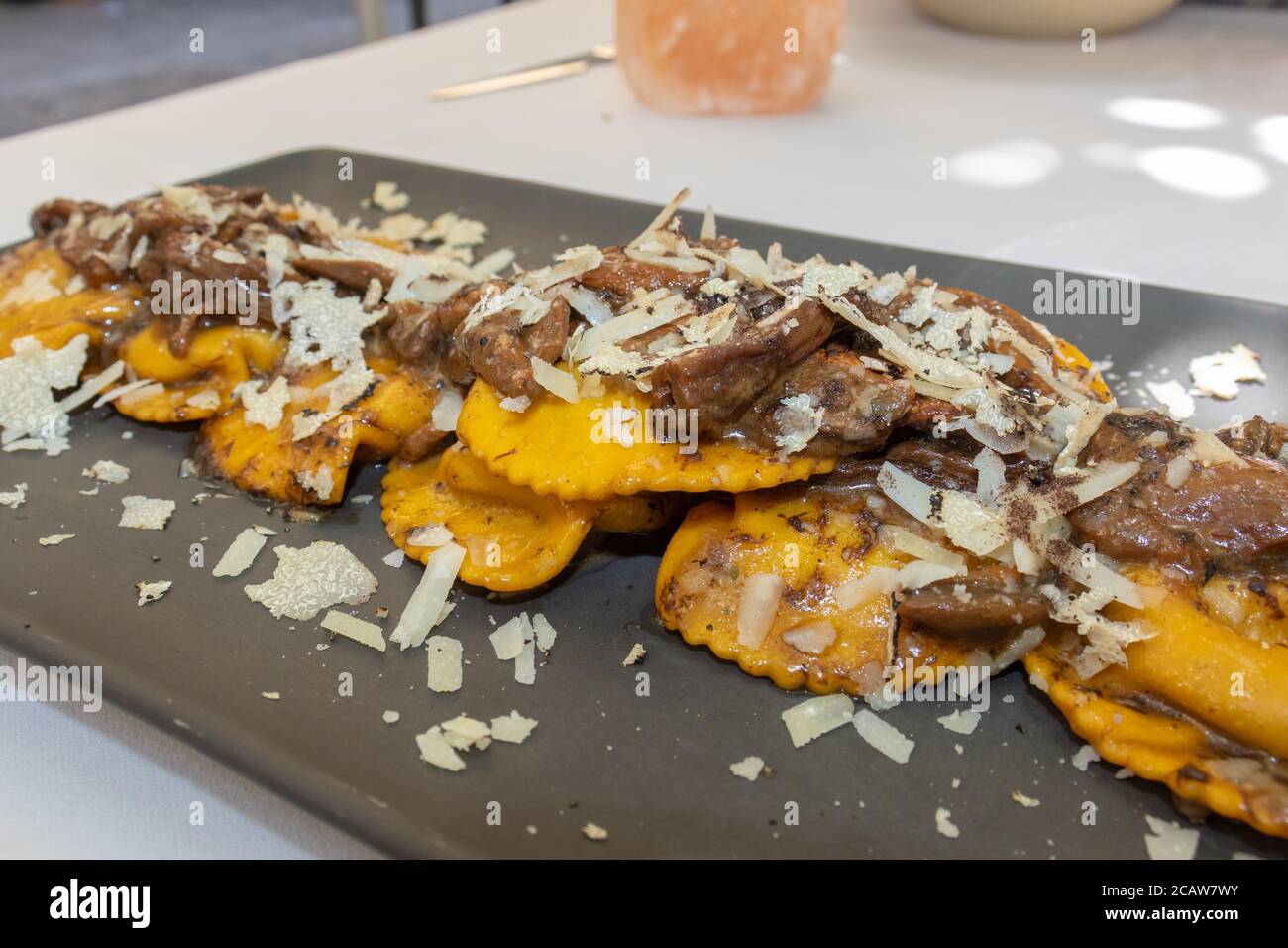 Delicious porcini mushroom ravioli with parmesan and truffles Stock Photo Alamy