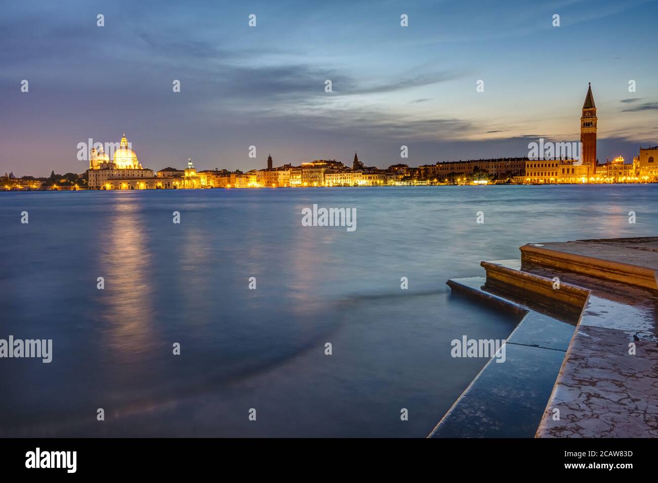 View to St Marks square and Punta della Dogana in Venice at night Stock Photo