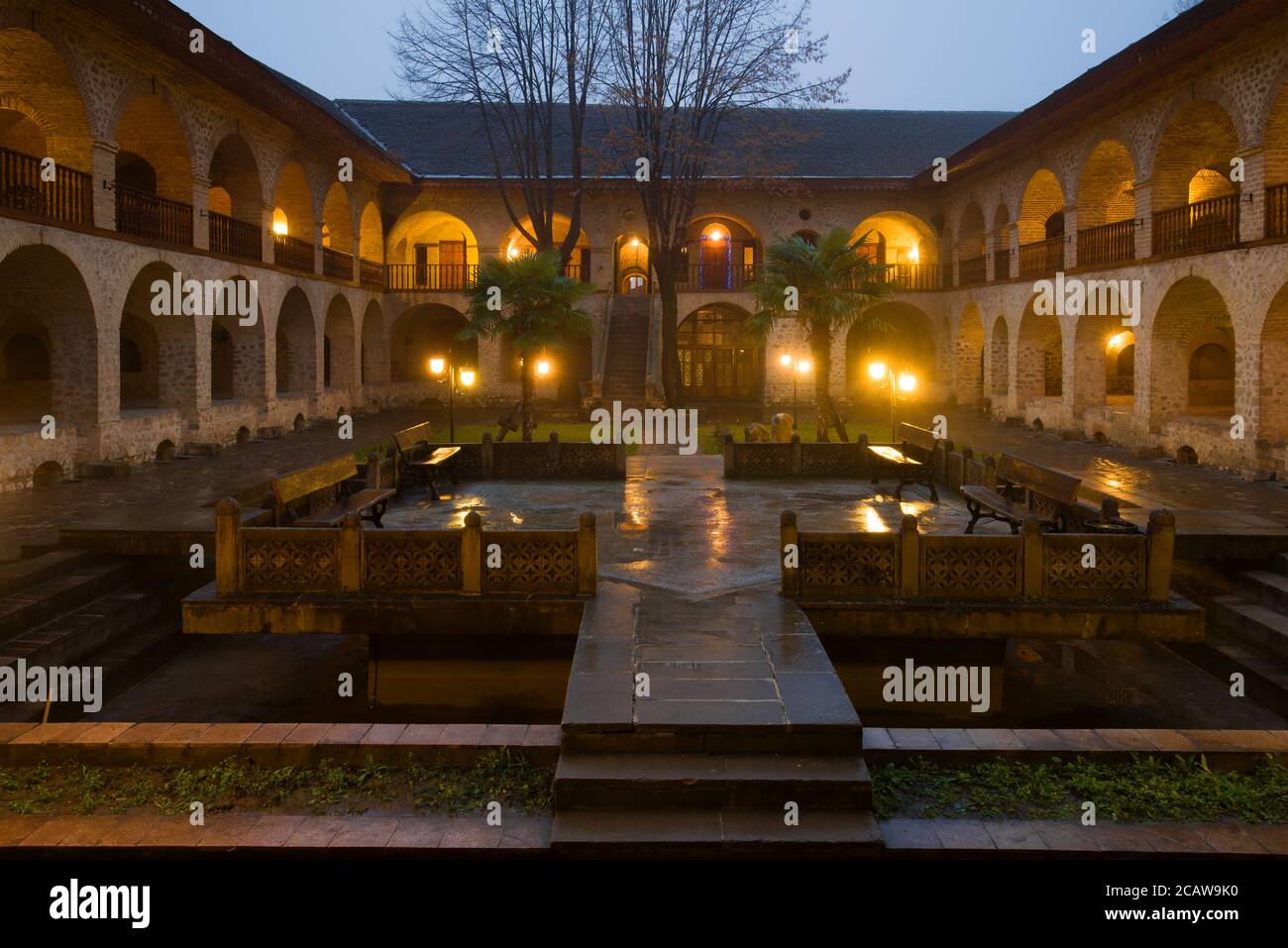 The courtyard of the Great Caravansary was raining January evening. Sheki, Azerbaijan Stock Photo