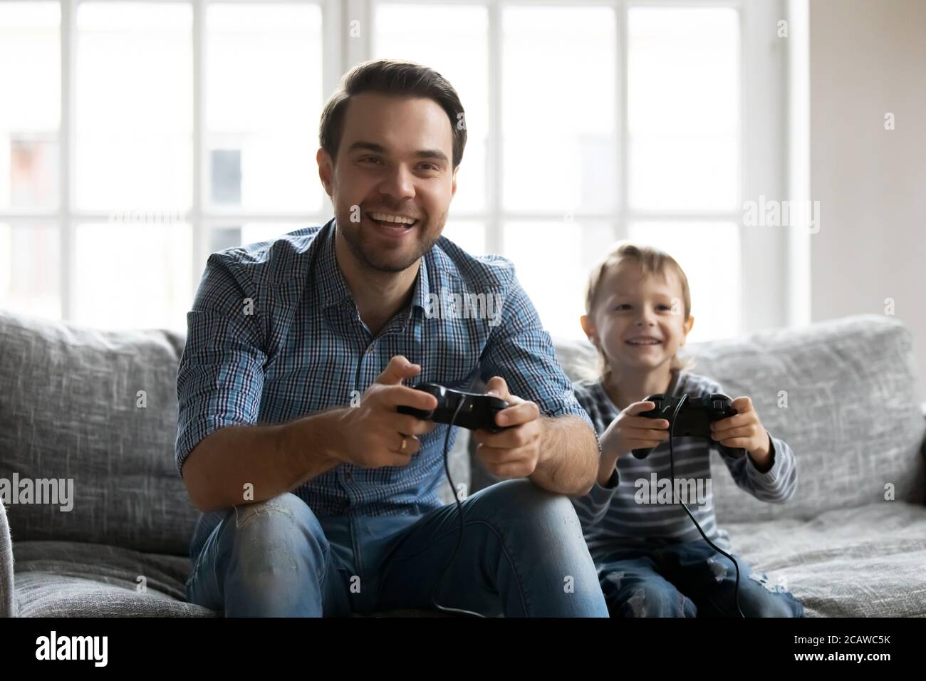 Child playing electronic games hi-res stock photography and images - Alamy