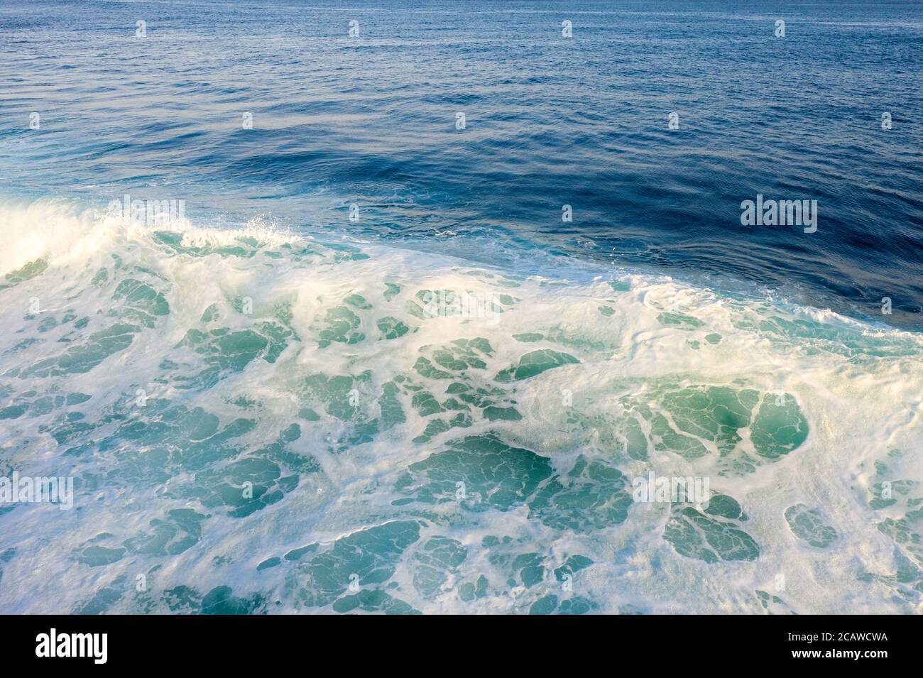 Ocean Waves Crashing Onto The Rocks In The Sunset Stock Photo, Picture And  Royalty Free ImageImage 81017512.