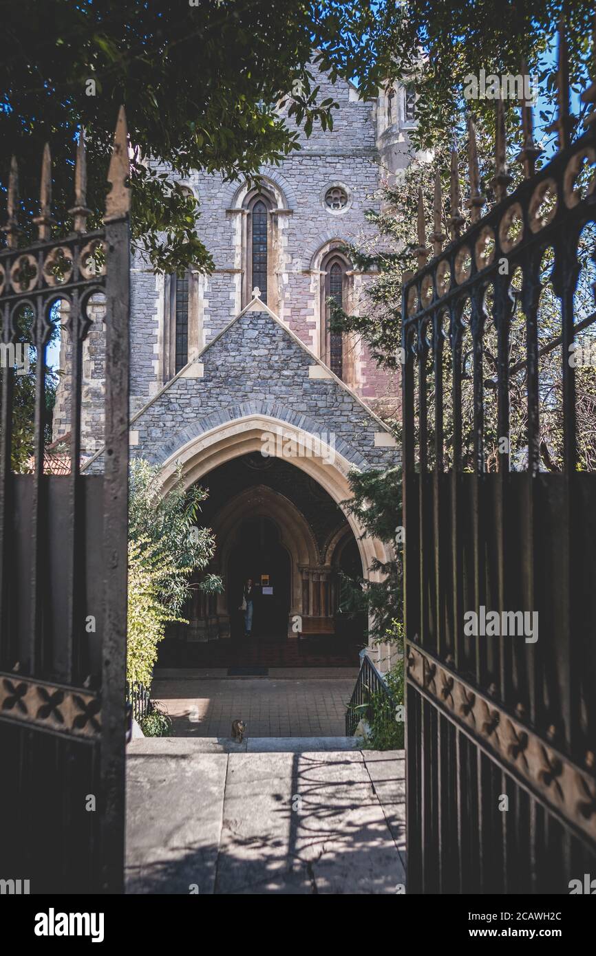 Vertical shot of opened gate and Kirim church on the background Stock Photo