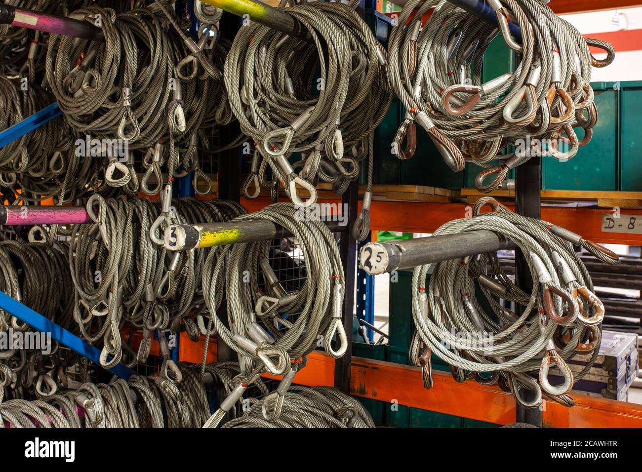 View of cables hanging on hooks Stock Photo Alamy