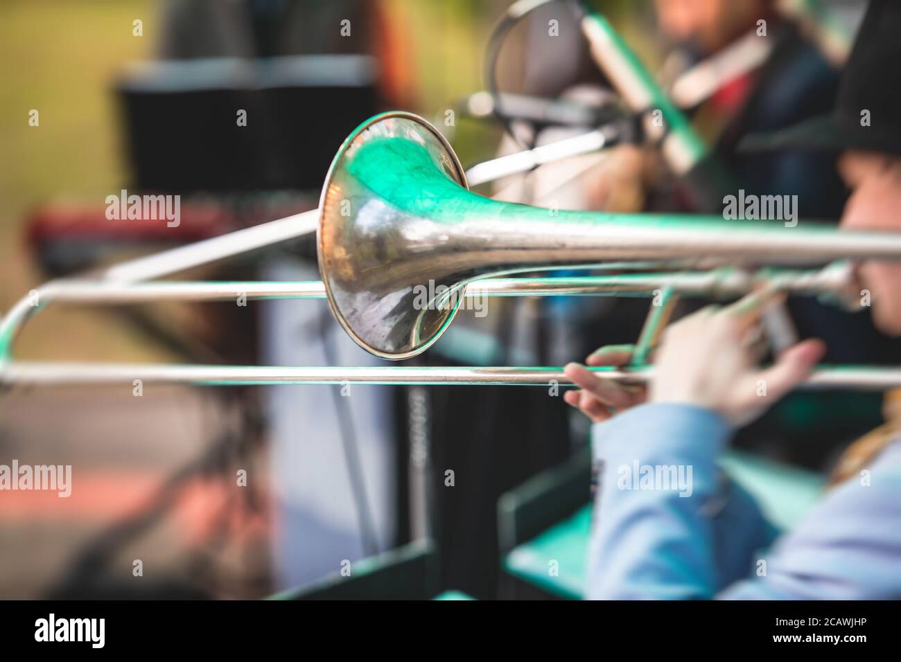 Concert view of a trombone player trombonist with musical jazz band