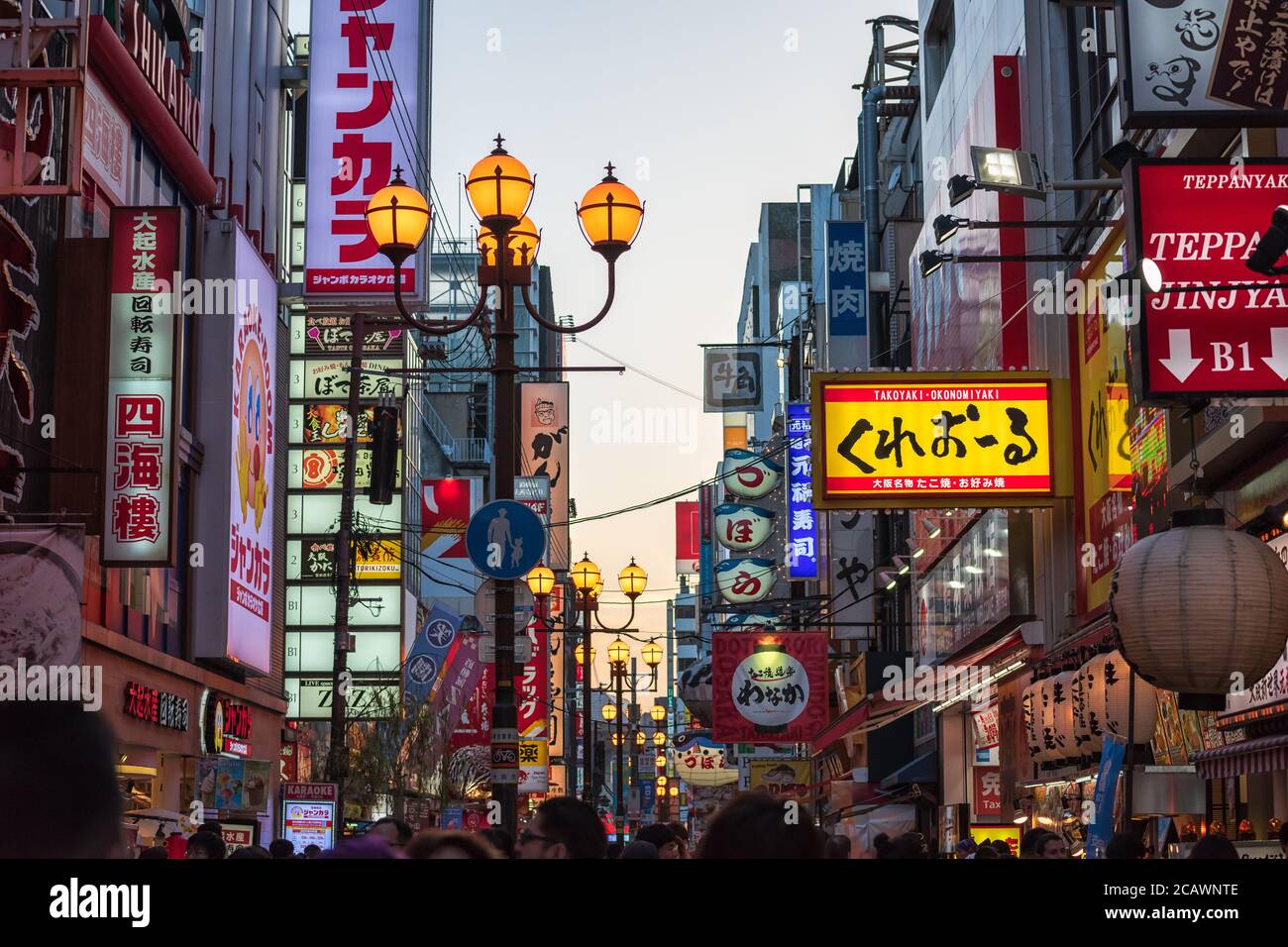 Crowd and tourist walking in shopping street at Dotonbori Stock Photo