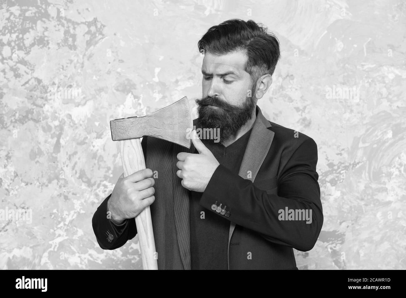 Threat to debtors. Brutal bearded man with axe. Debt collection is process of pursuing payments of debts owed by individuals or businesses. Collection agency or debt collector. Businessman with ax. Stock Photo