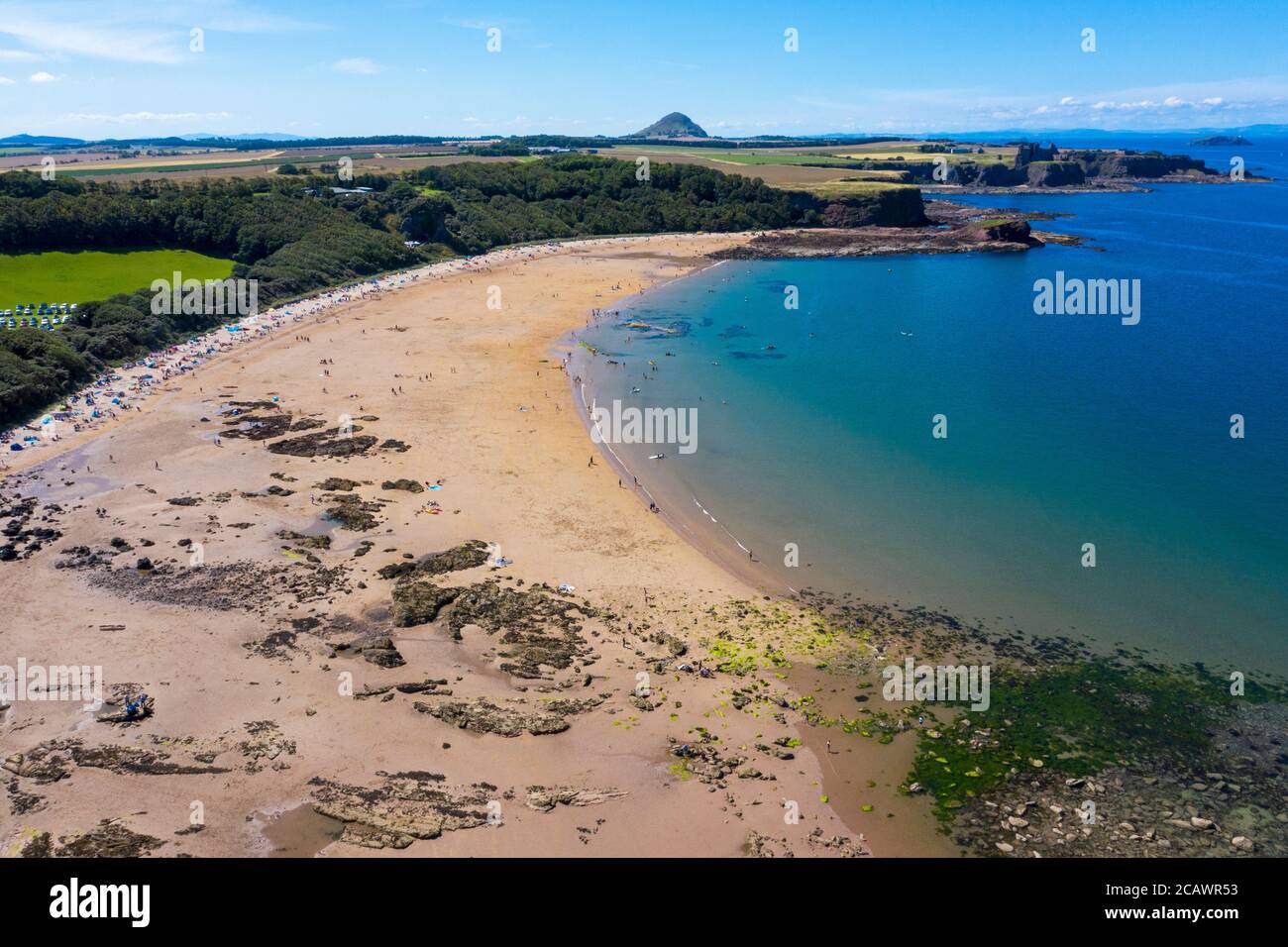 Aerial view of seacliff beach with North Berwick Law in the distance, East Lothian, Scotland. Stock Photo