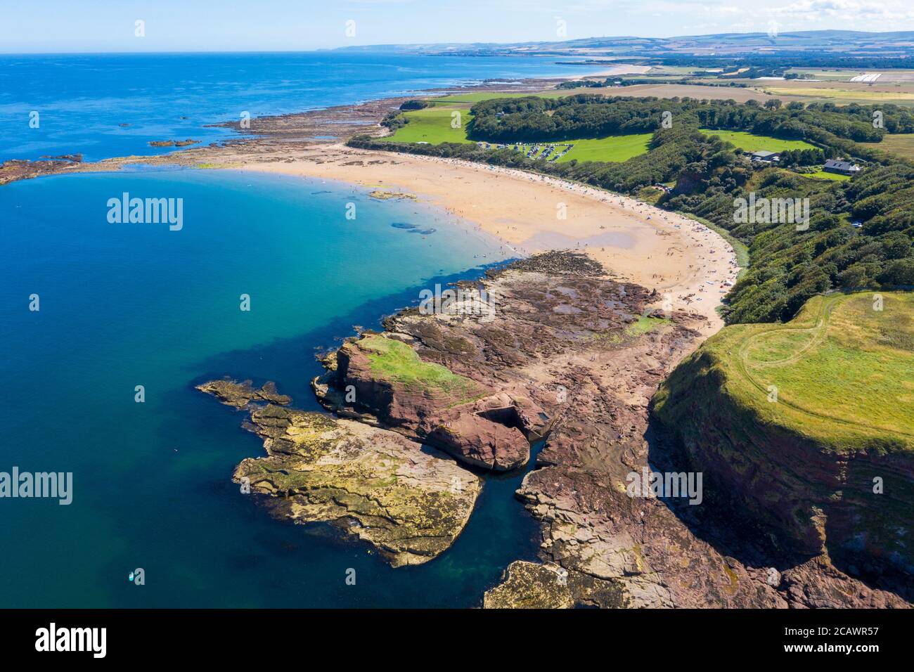Aerial view of seacliff beach with North Berwick Law in the distance, East Lothian, Scotland