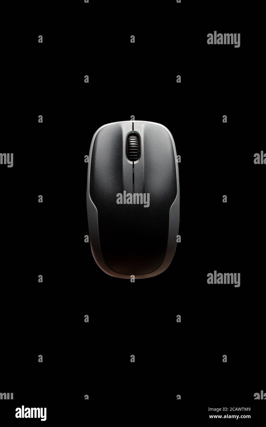 computer mouse isolated on the black background. Stock Photo