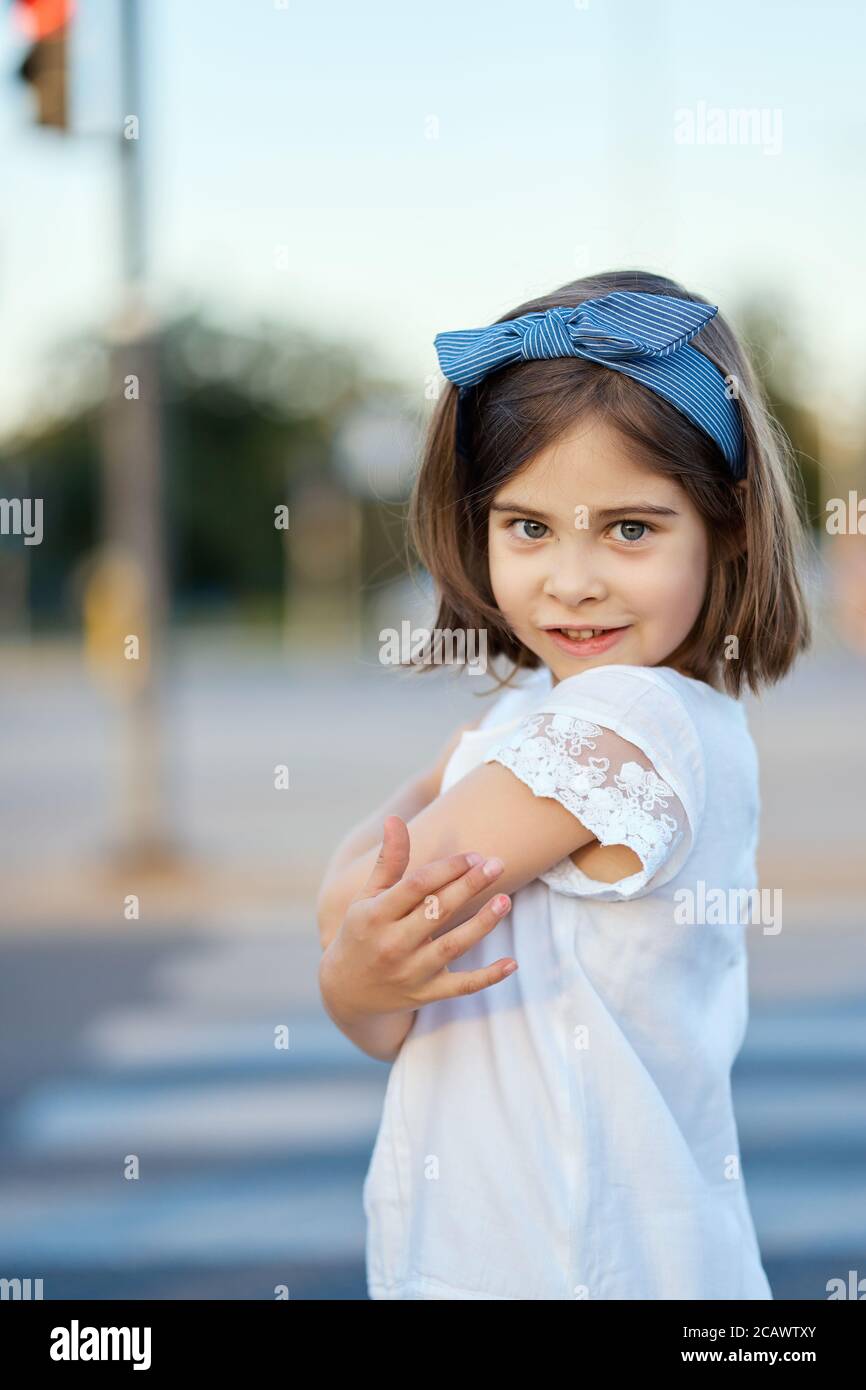 cute girl pose on the city street at sunset  Stock Photo
