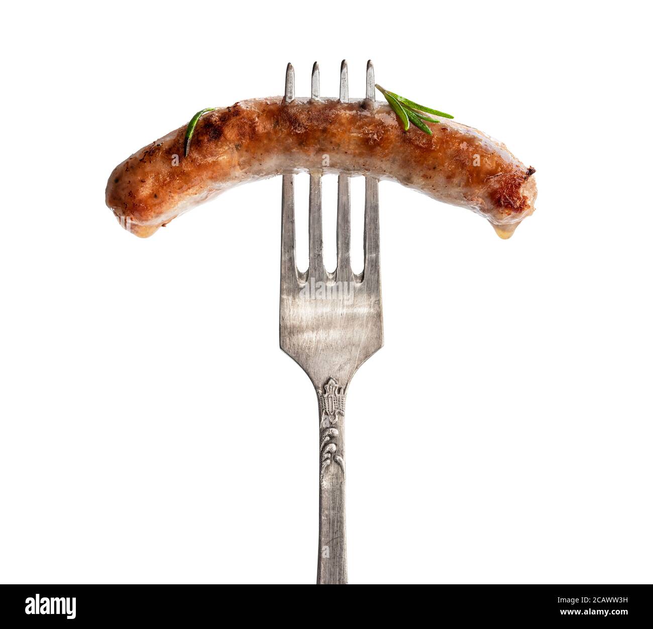Cooked sausage chipolatas on a fork isolated on white background Stock ...