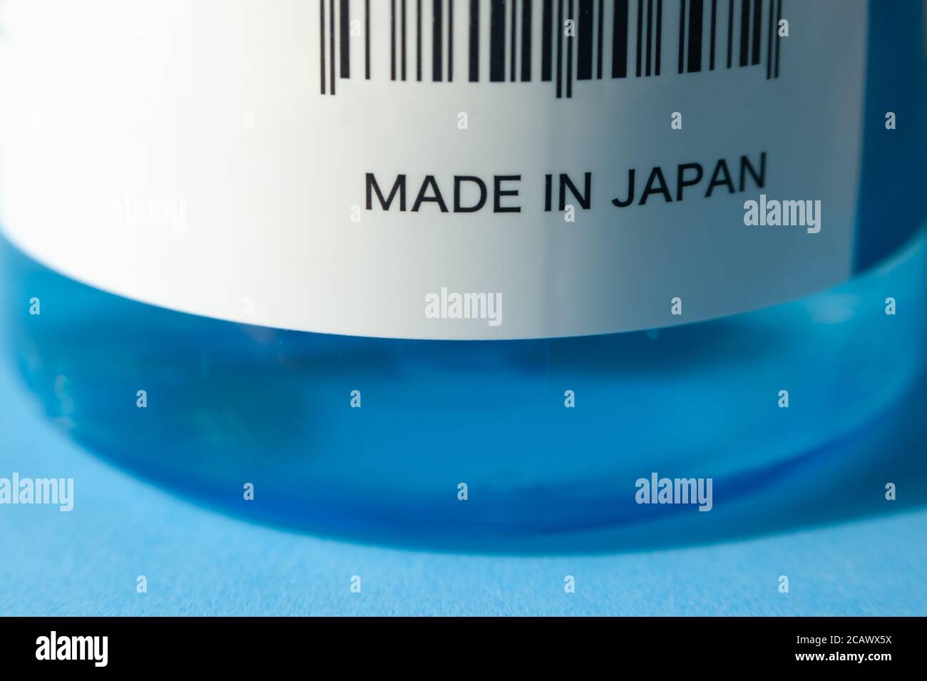MADE IN JAPAN label written on pump bottle alcohol gel. Barcode. Close-up. Stock Photo