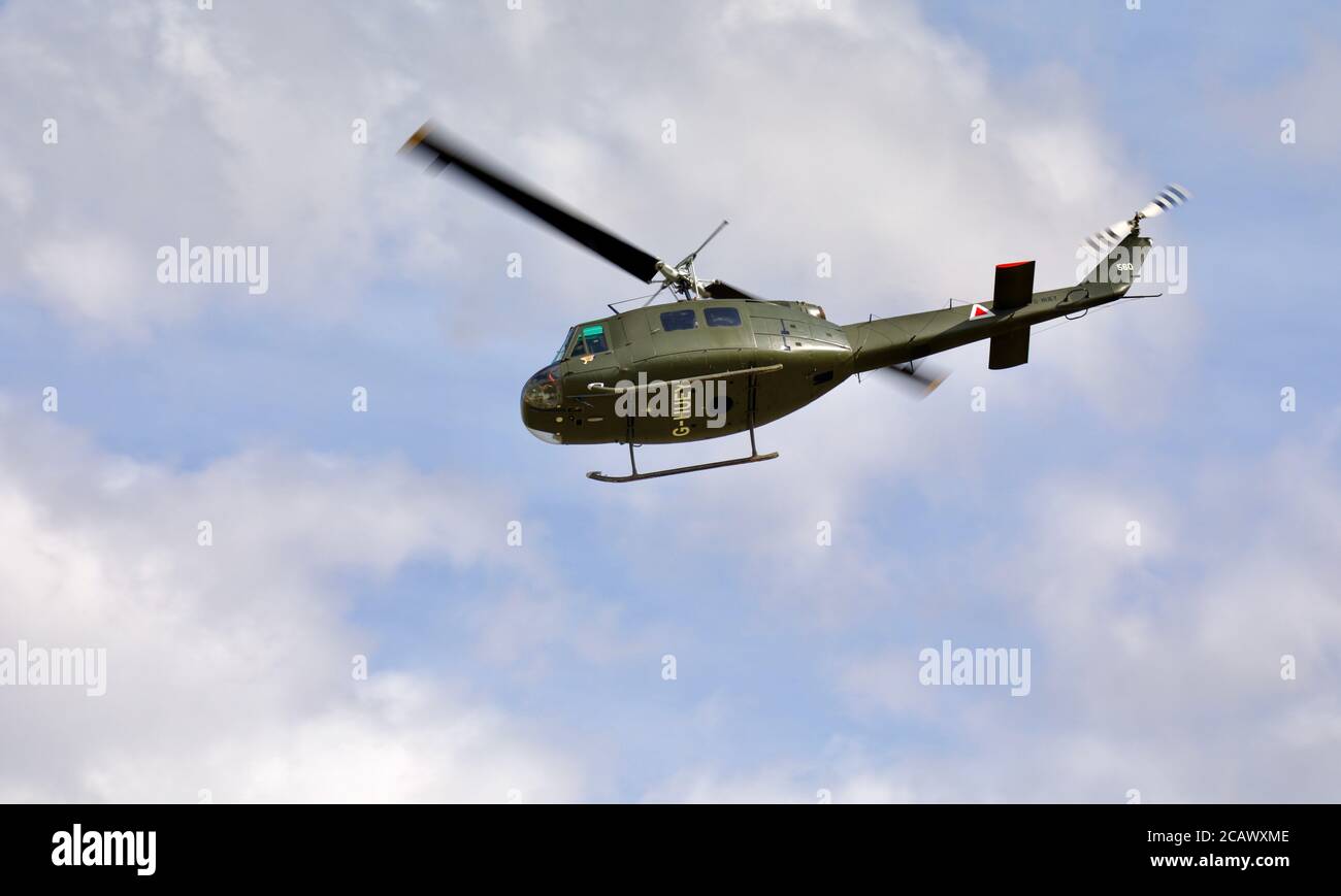 Bell UH-1H Iroquois 560 (G-HUEY) performing at Shuttleworth Drive-in Airshow on the Sunday 2 August 2020 Stock Photo