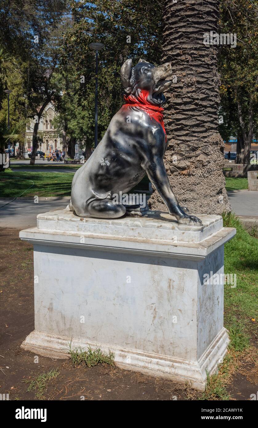 dog monument (Black Cop Killer) with red bandana in park italia, Valparaiso, Chile Stock Photo