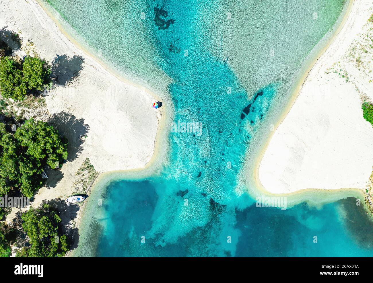 Aerial photo of white beach and blue sea lagoon at Halkidiki peninsula