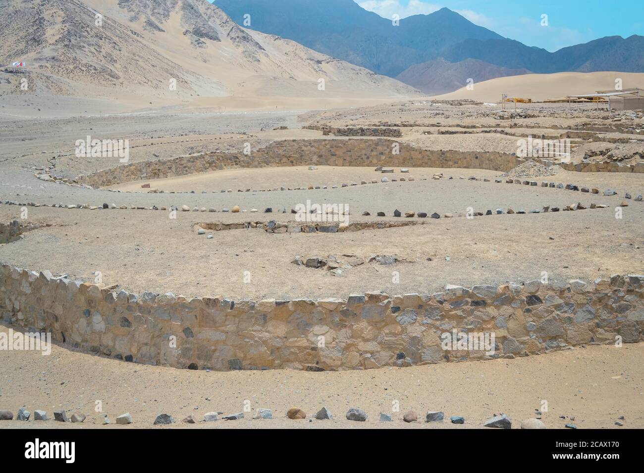 Ruins of the ancient archaeological site of Caral located in Peru during daylight Stock Photo