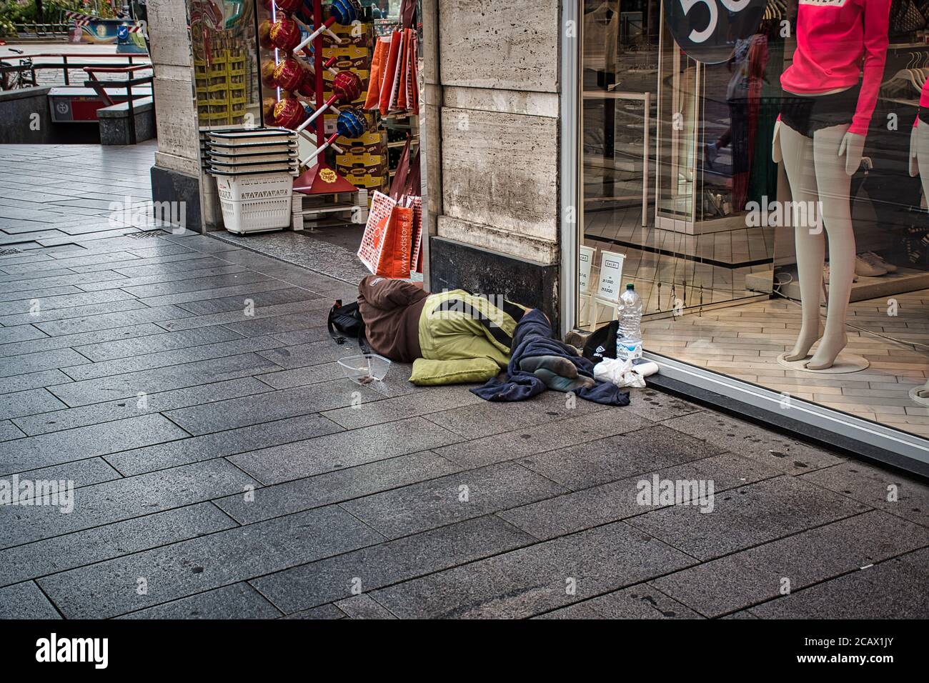 Milan, Italy 08.08.2020: Homeless people on the streets of Milan Stock Photo