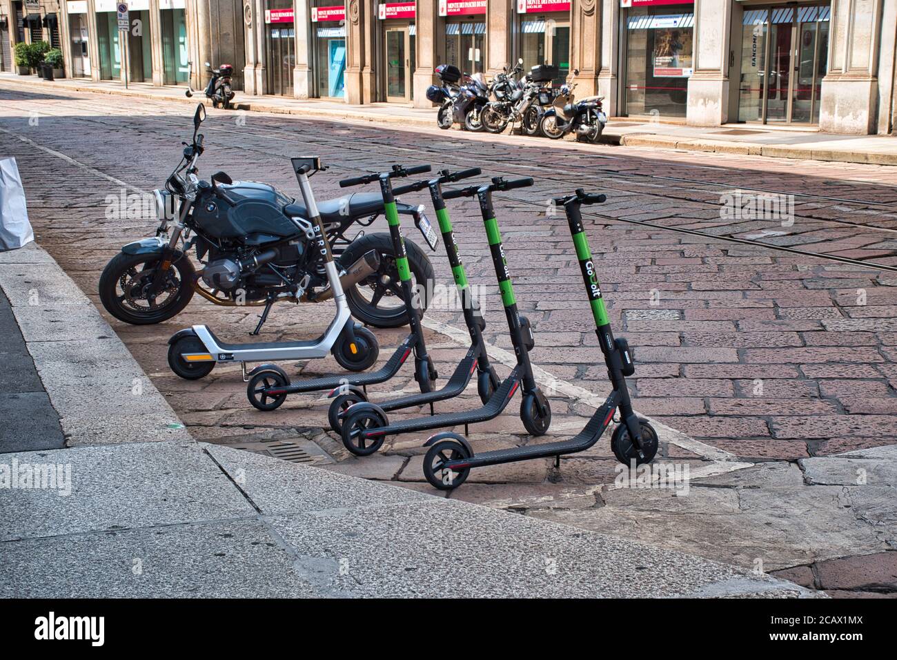 Milan, Italy 08.08.2020 Electric scooters parking in downtown Milan