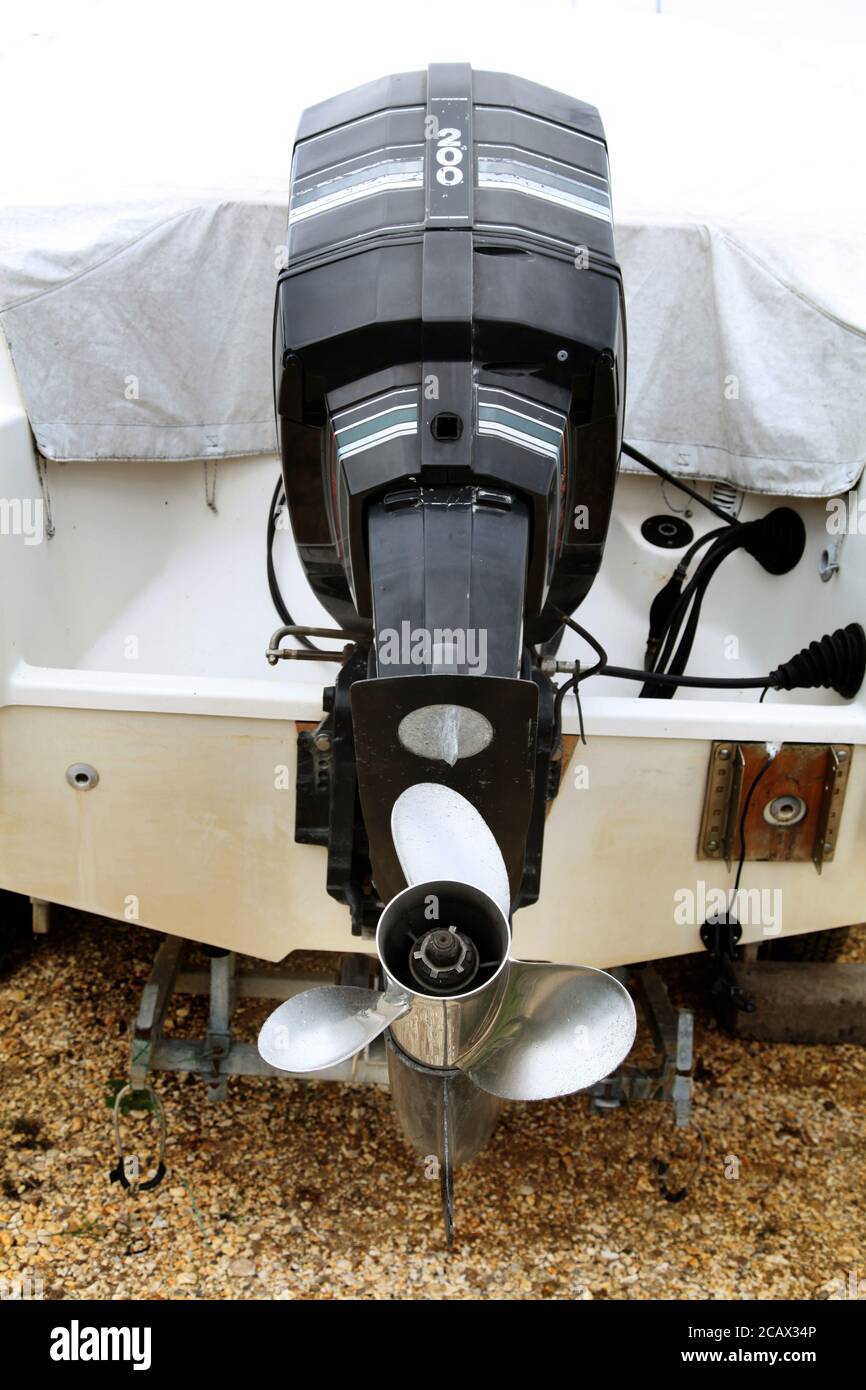 Mercury 200 2.5litre boat engine with propellor attached to boat at