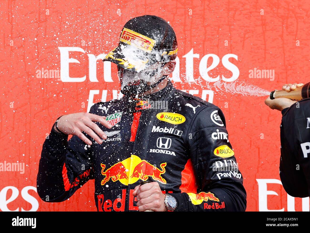 Formula One F1 70th Anniversary Grand Prix Silverstone Circuit Silverstone Britain August 9 2020 Red Bull S Max Verstappen Celebrates His Win On The Podium After The Race Pool Via