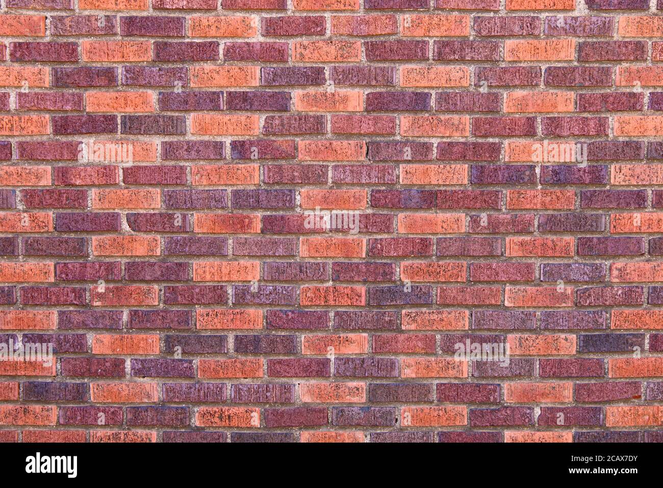 red brown colored textured lined aligned pattern brick wall, rich ...