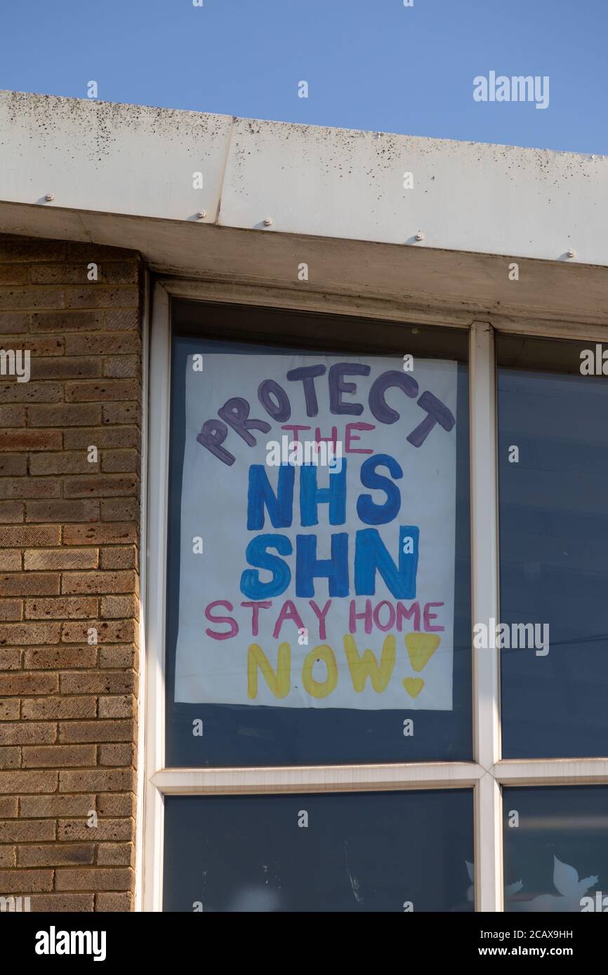 A picture in a window saying protect the NHS supporting the NHS during the coronavirus or covid-19 pandemic Stock Photo