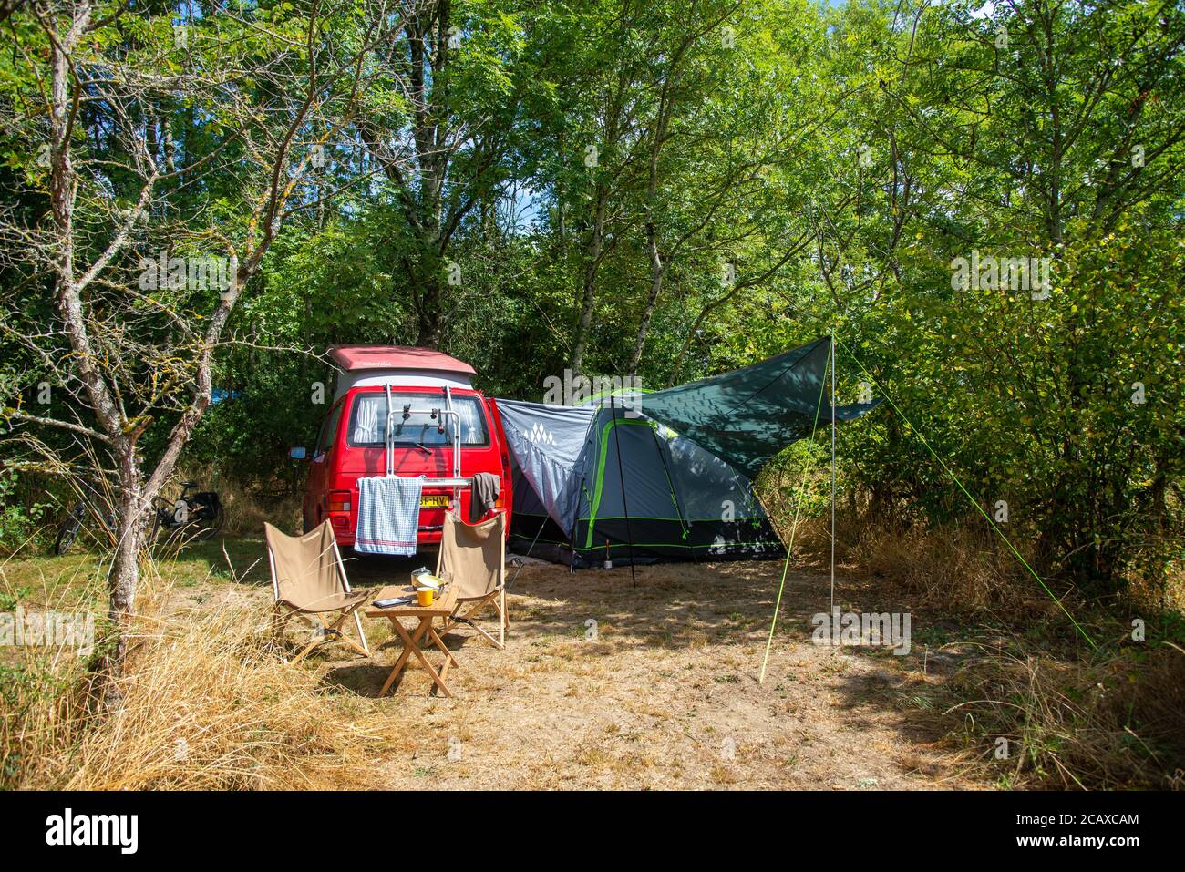 VW T4 camper with bustent at campsite Lotussy in Tussy, Morvan, France  Stock Photo - Alamy