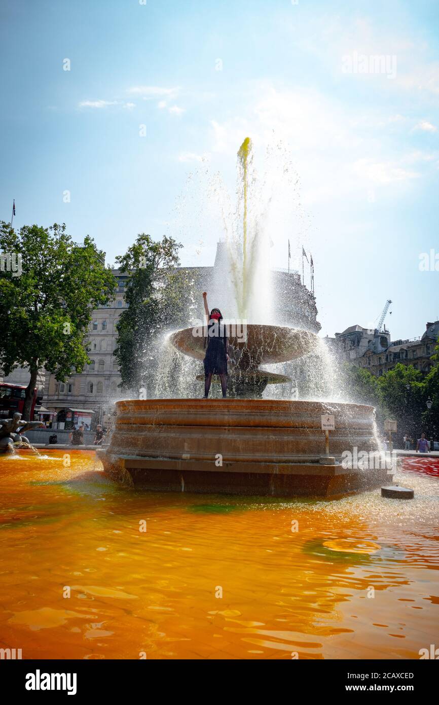 09/08/20 London, UK. XR activists covered the stairs of Trafalgar Sq. with fake blood to mark the International Day of the World’s Indigenous Peoples Stock Photo