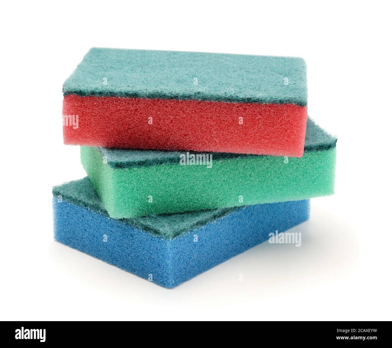 Four multicolored sponges for dishes isolated on white. Stock Photo