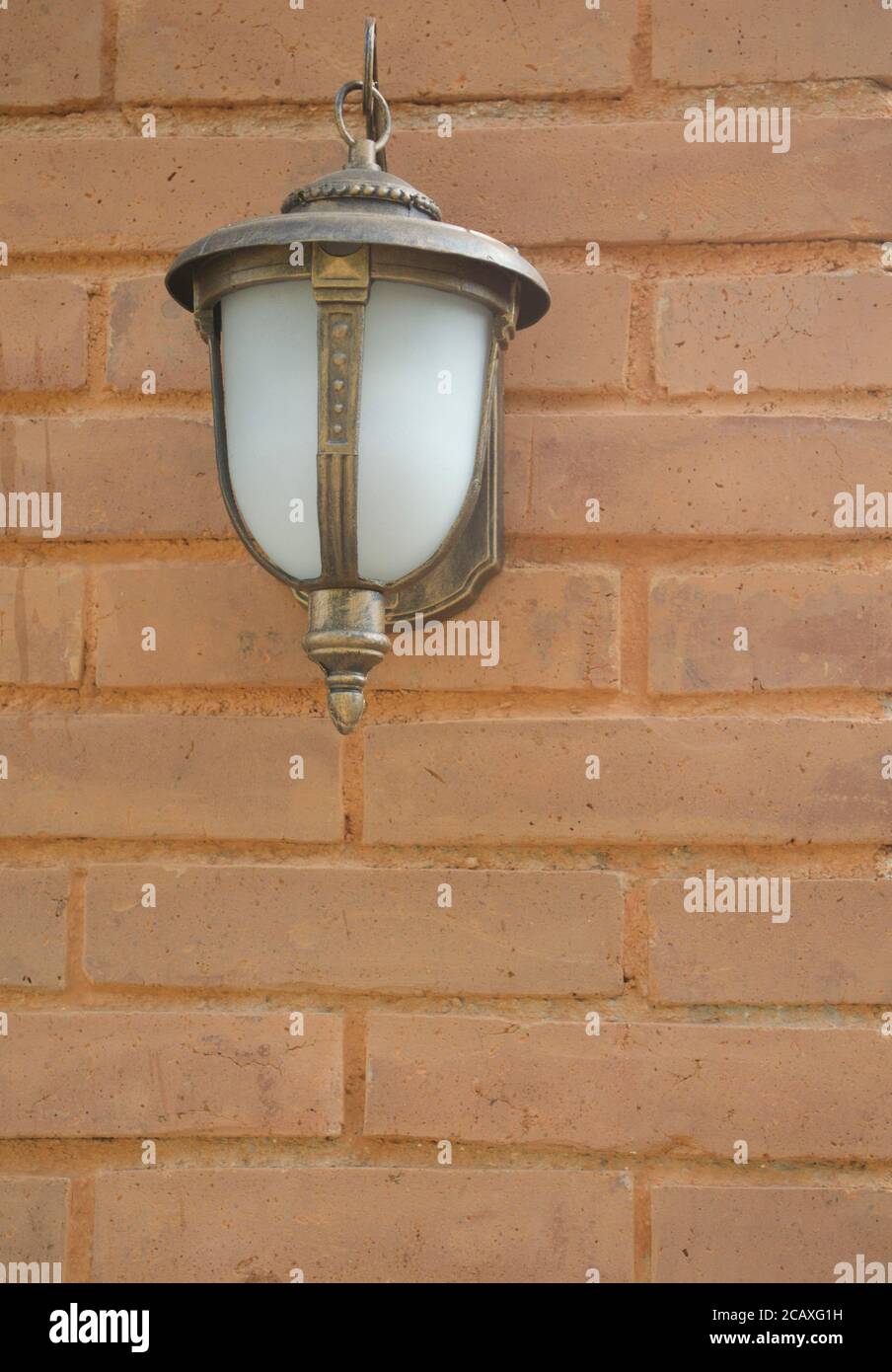 Classic Modern Style Wall Lamps Attached To The Textured Brick Wall Background Stock Photo
