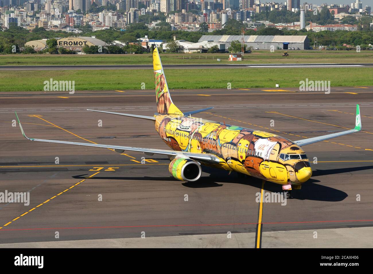 Gol Airlines Boeing 737 with graffiti special livery done by Os Gemeos Brazilian artists. The Twins aircraft paint scheme in Porto Alegre, Brazil. Stock Photo