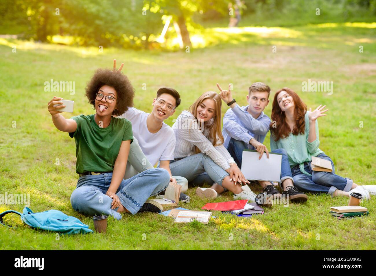 Selfie Fun. Group Of Multiracial Students Fooling While Taking Group Photo Outdoors Stock Photo