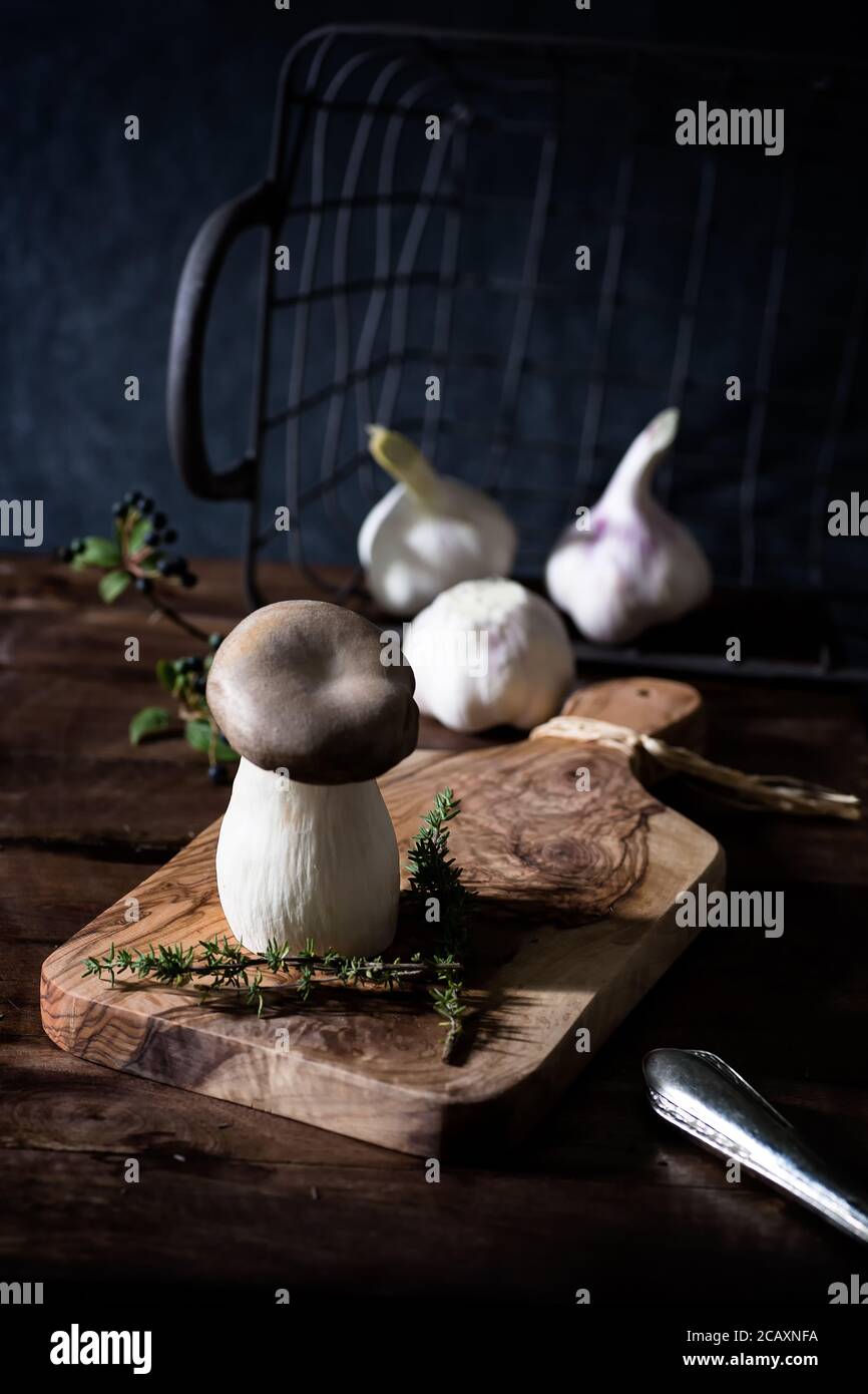 Herb seitling on an olive wood board Stock Photo