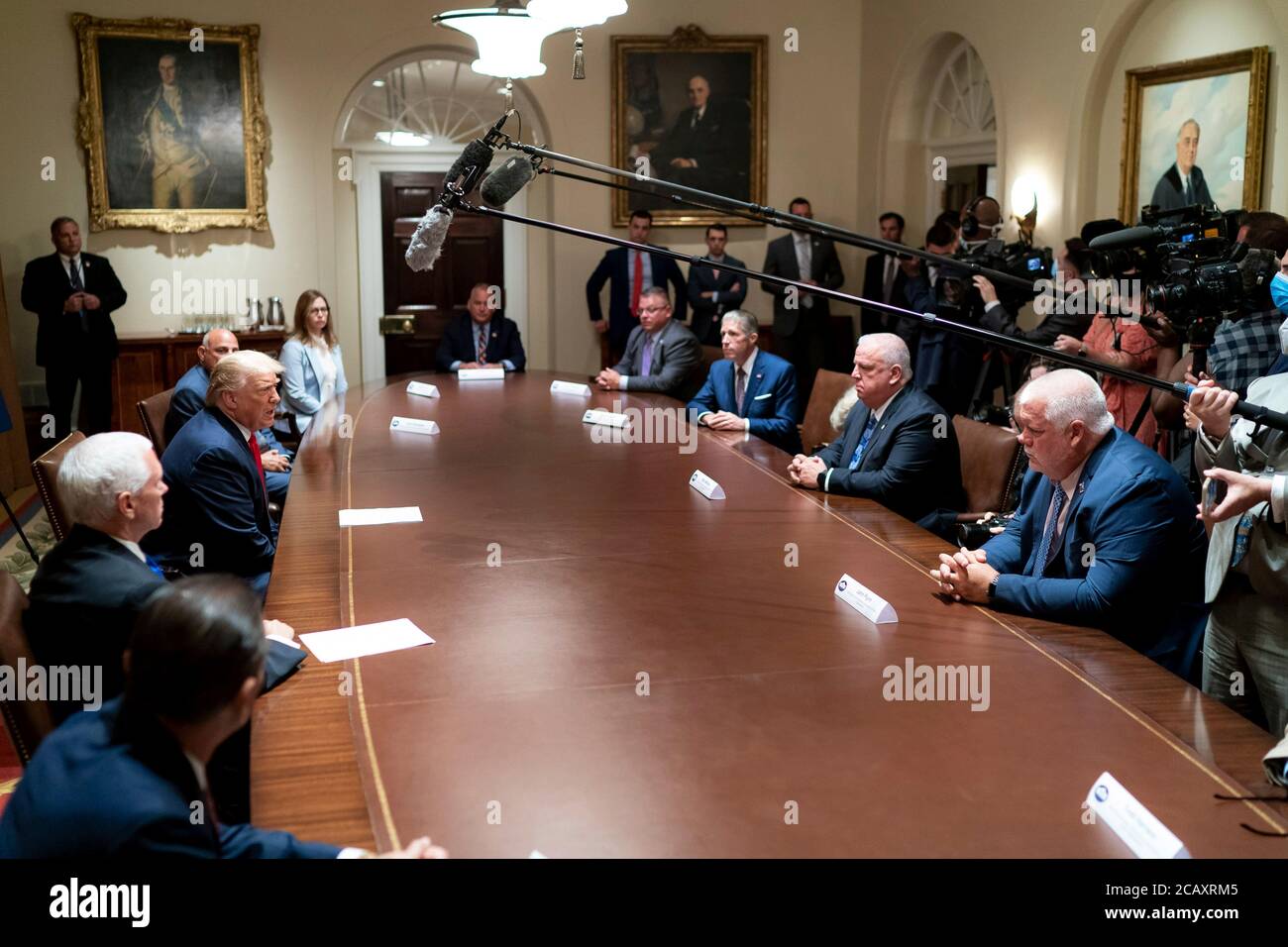 U.S. President Donald Trump and Vice President Mike Pence during a meeting with the leadership of the National Association of Police Organizations in the Cabinet Room of the White House July 31, 2020 in Washington, DC. Stock Photo
