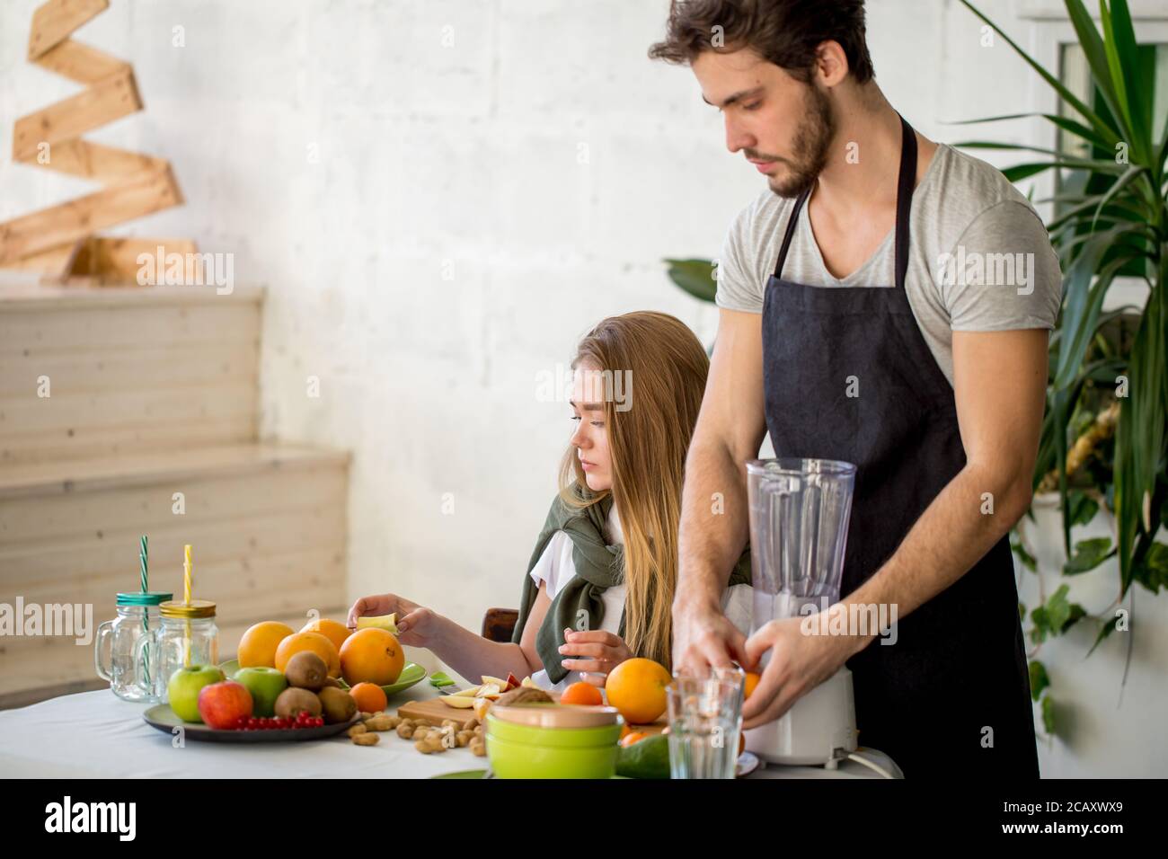 process of preparing fruit milkshake. close up photo Stock Photo - Alamy