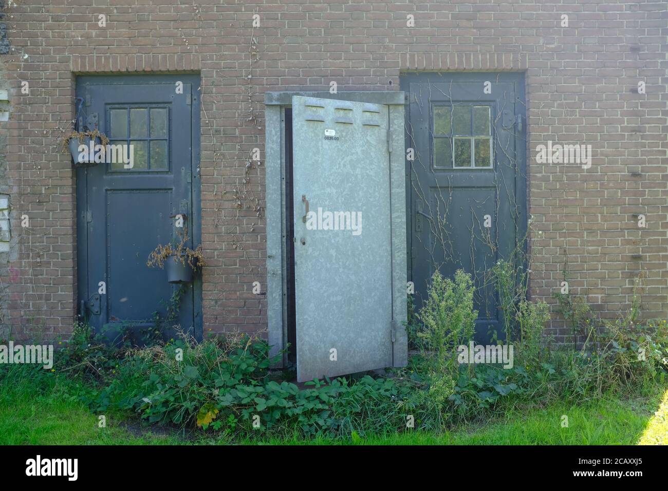 Abandoned industrial warehouse building on old industrial park called Hembrug in the Netherlands Stock Photo