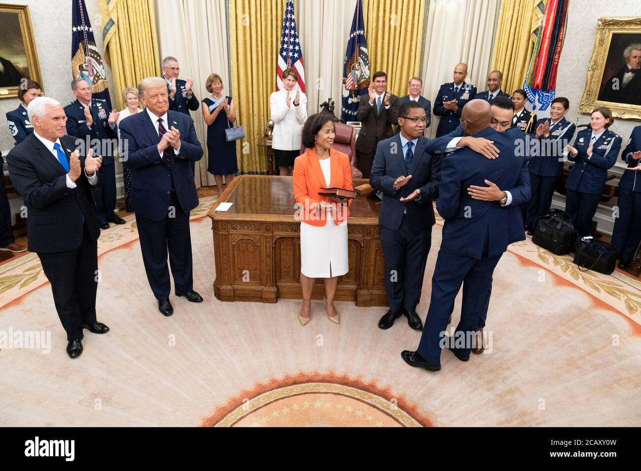 U.S. Air Force General Charles Q. Brown, is embraced by his son after being sworn in as the new Air Force Chief of Staff in the Oval Office Room of the White House August 4, 2020 in Washington, DC. Stock Photo
