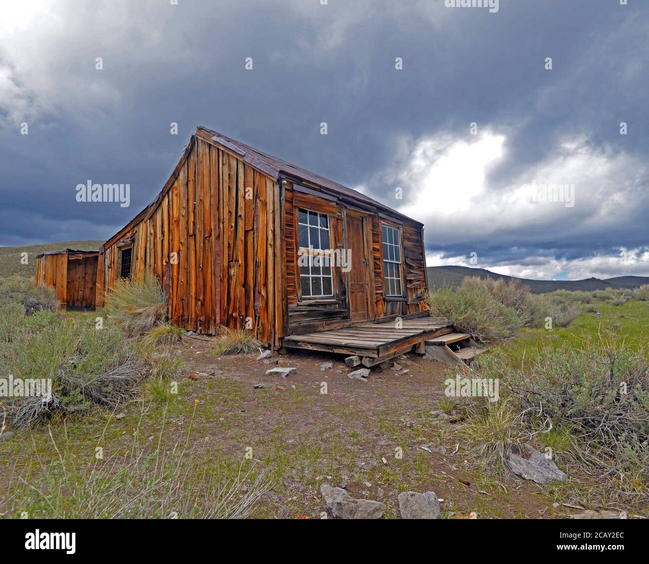 Bodie.  Small abandoned cabin on an wet overcast fall day in Bodie Ghost town. Bodie, California USA Stock Photo