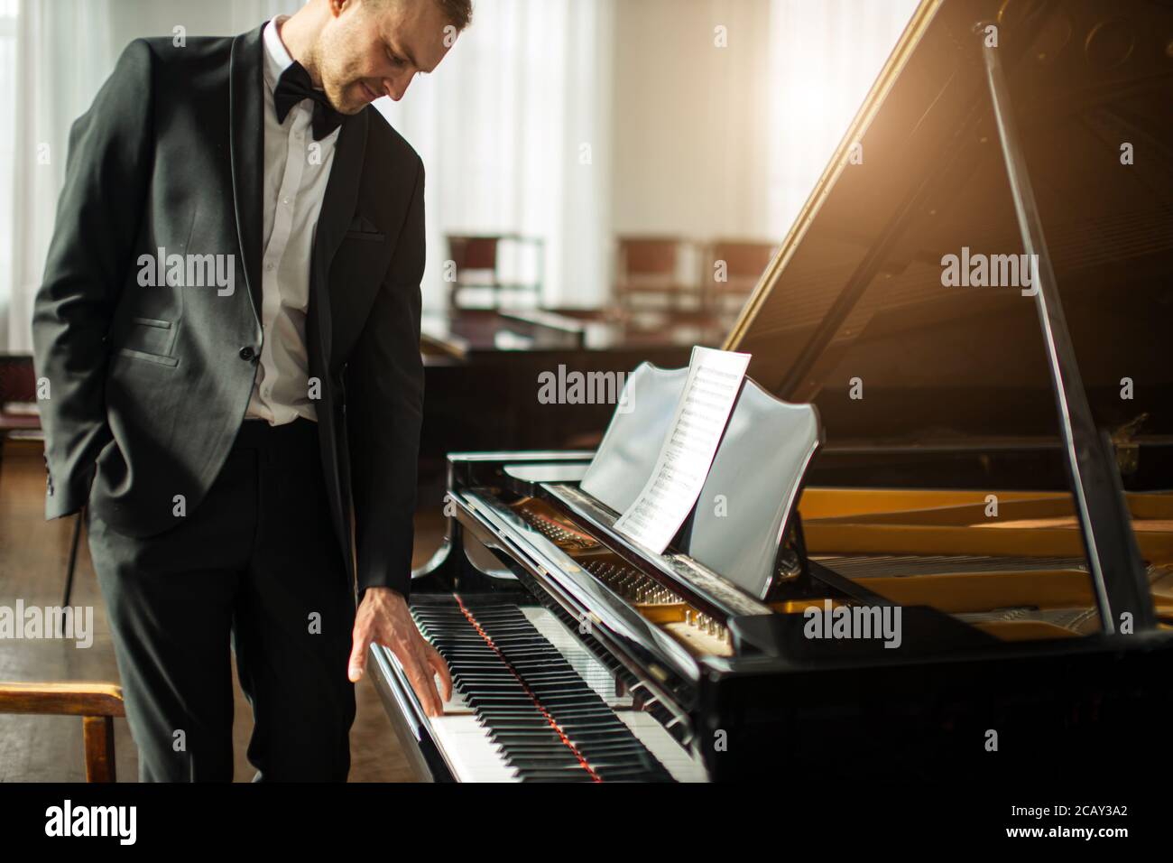 Playing Piano Suit High Resolution Stock Photography and Images - Alamy
