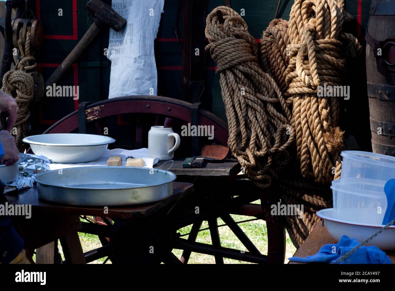 Shaving Kit for outdoors with wagon wheel and a rope Stock Photo - Alamy